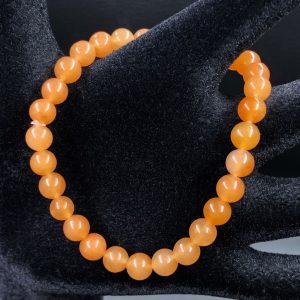 Bracelet en calcite orange perles de 6mm « top qualité »