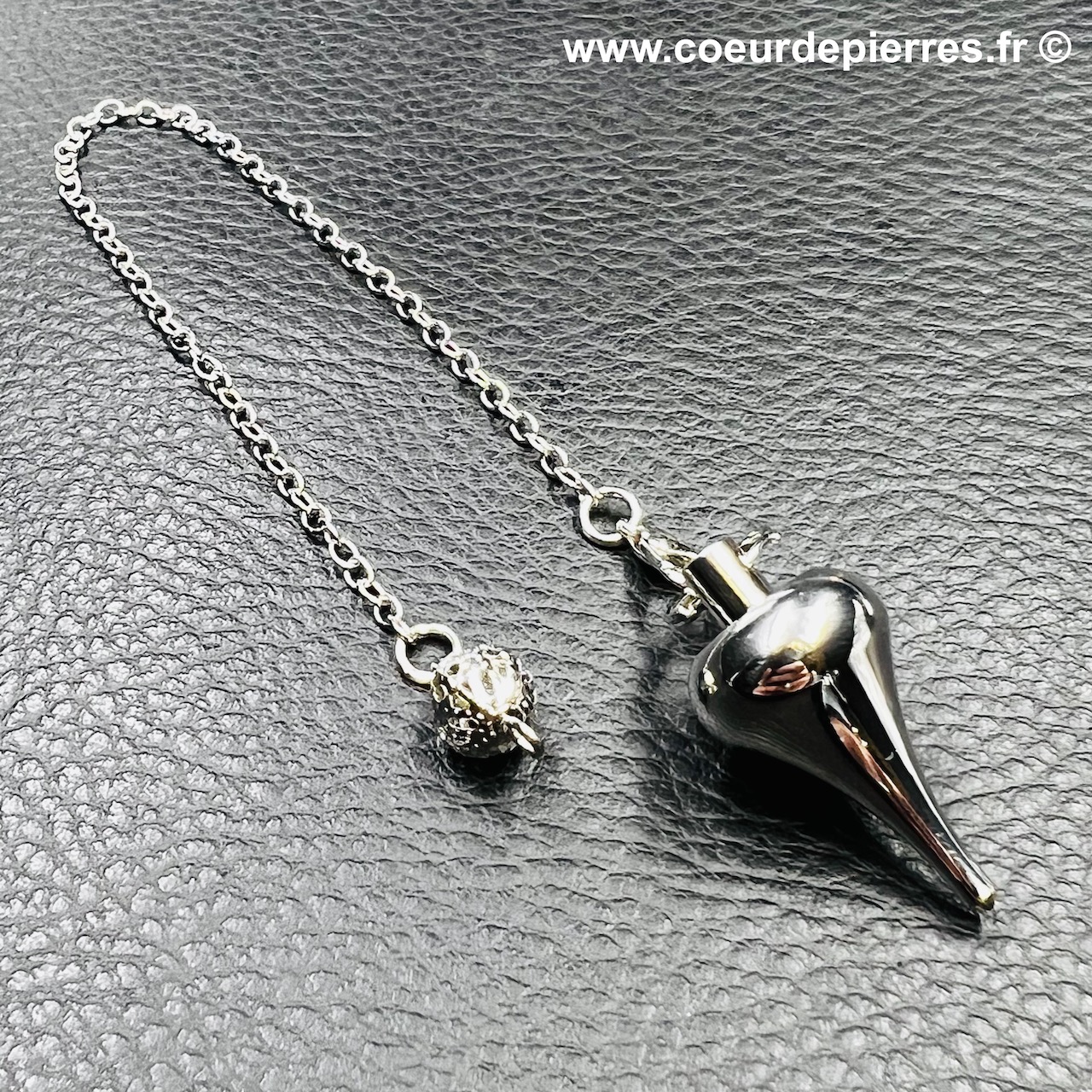 Pendule «conique» en métal argenté (réf pm12)